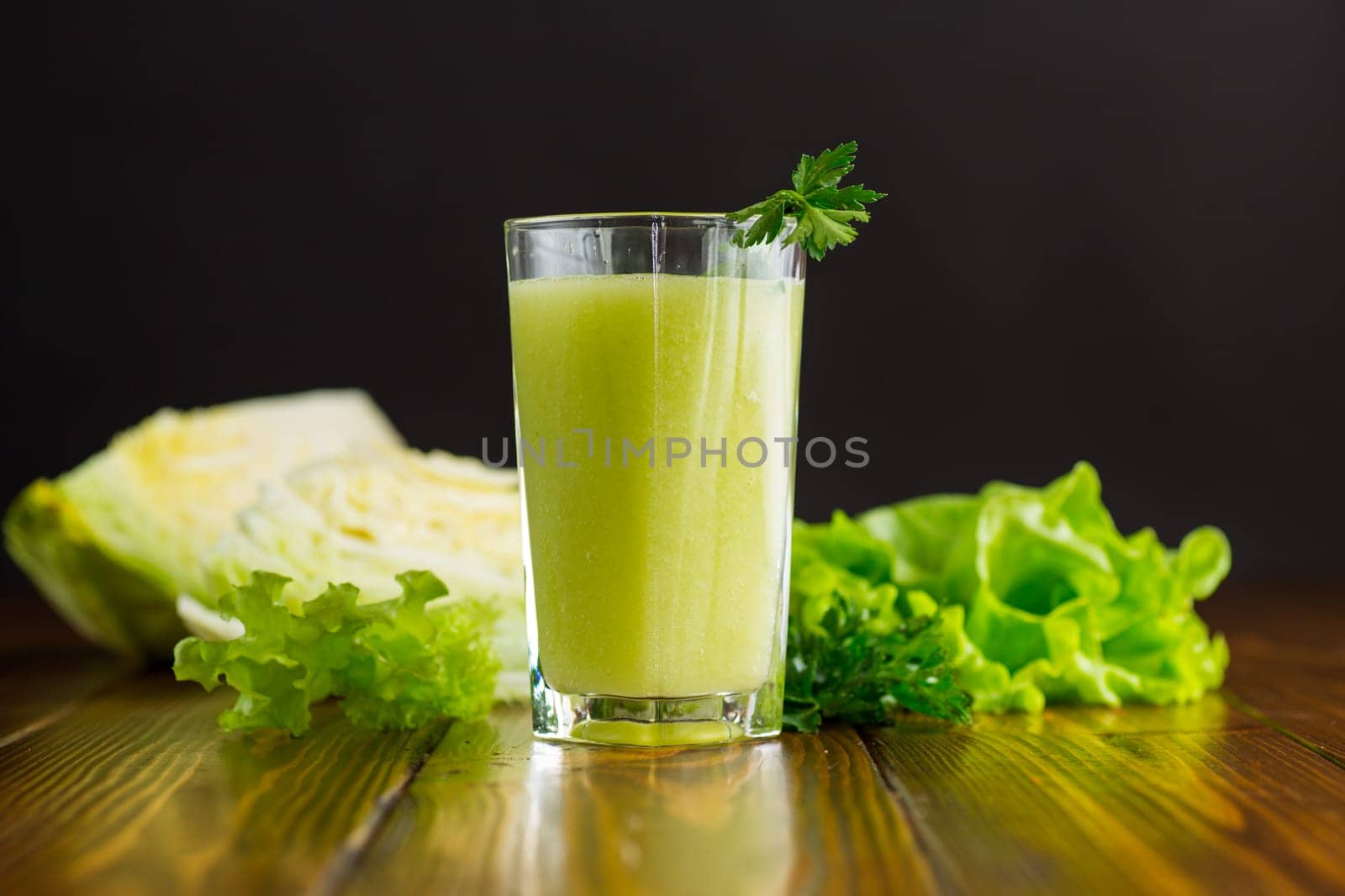 vegetarian smoothie made from green vegetables, cabbage, lettuce, greens .