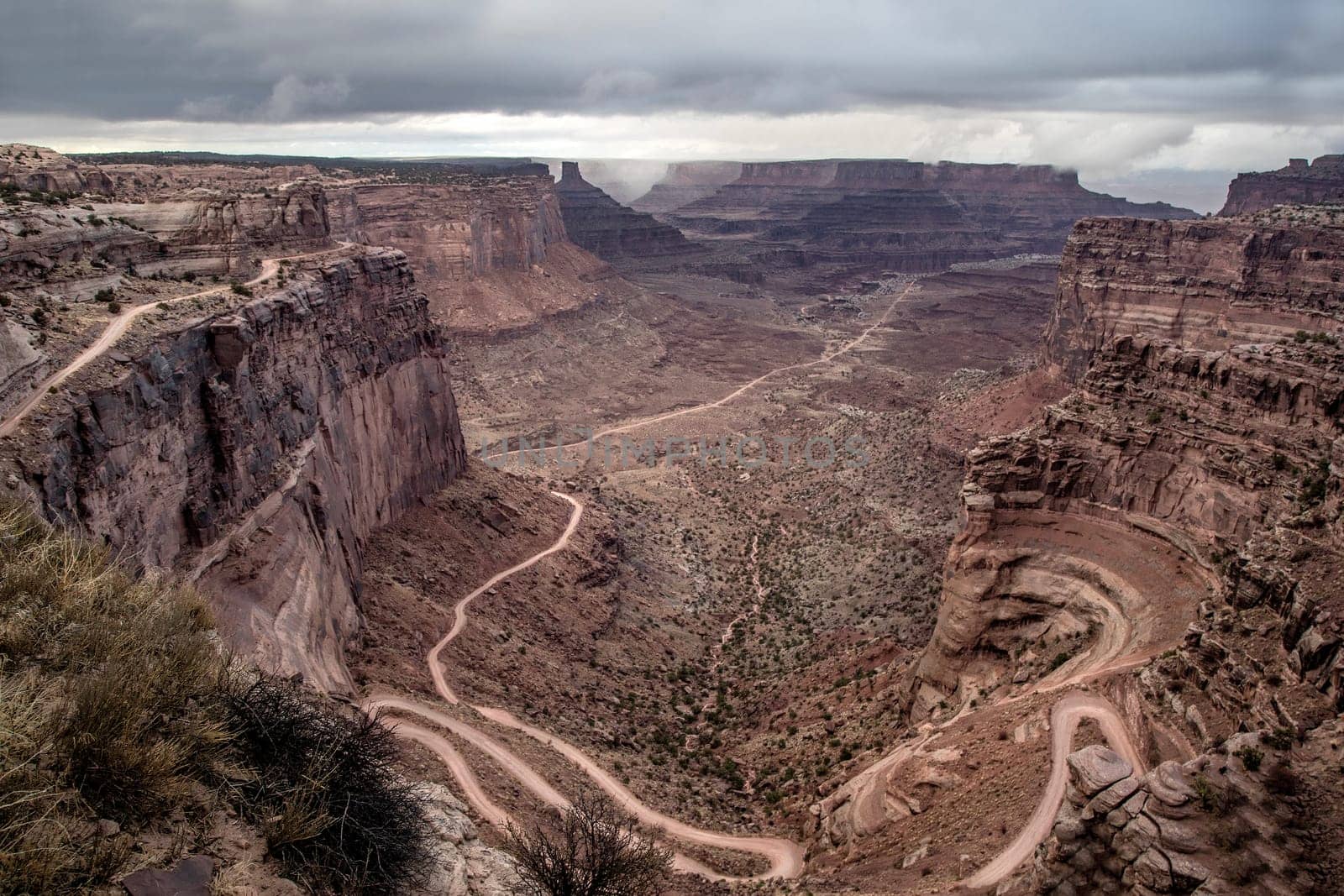 A rainstorm makes its way through Canyonlands National Park,Utah  as seen from the Shafer Trail Viewpoint.