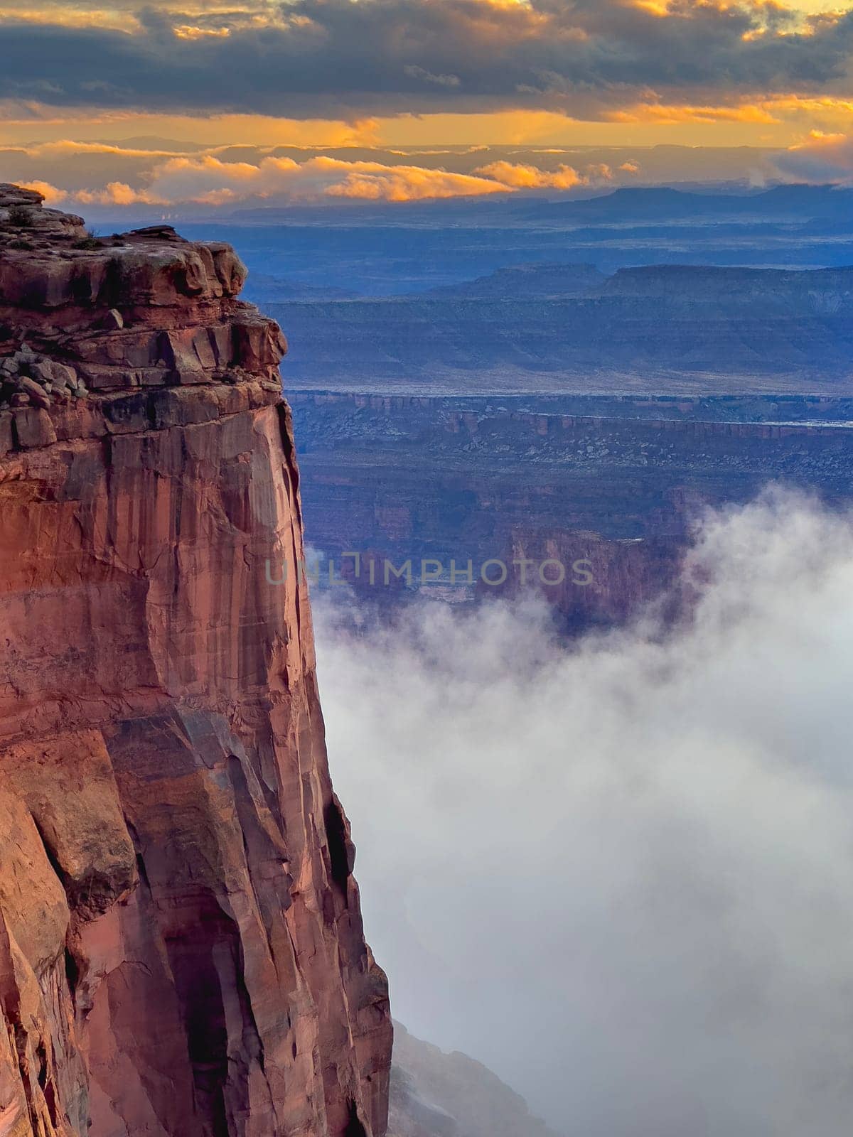 A passing rainstorm brings some clouds, fog and  dramatic looks to the landscape at Dead Horse Point State Park, Utah