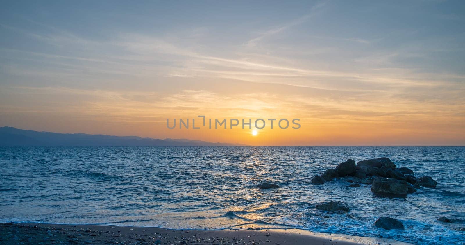 The Mediteeranean Sea offer us amazing sunsets like this over the Mountains 2