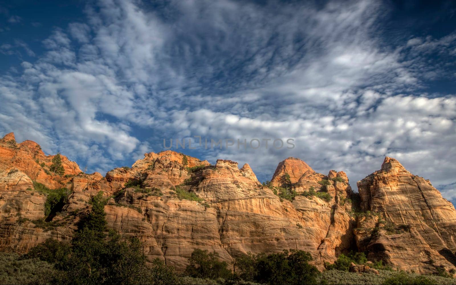 Clouds pass through Kolob Terrace at Zion National Park, Utah