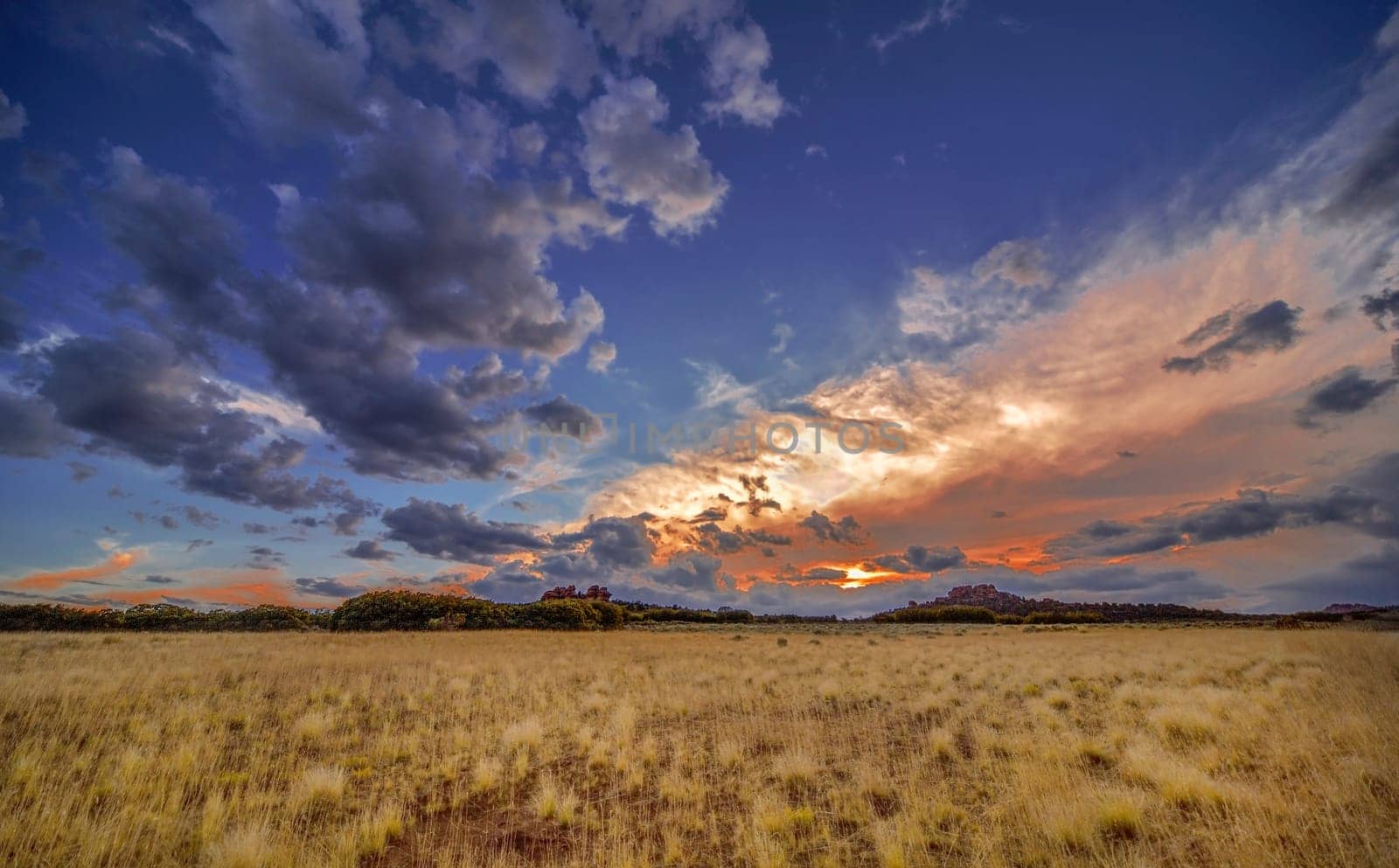 Passing storm clouds appear at sunset over Kolob Terrace at Zion National Park, Utah