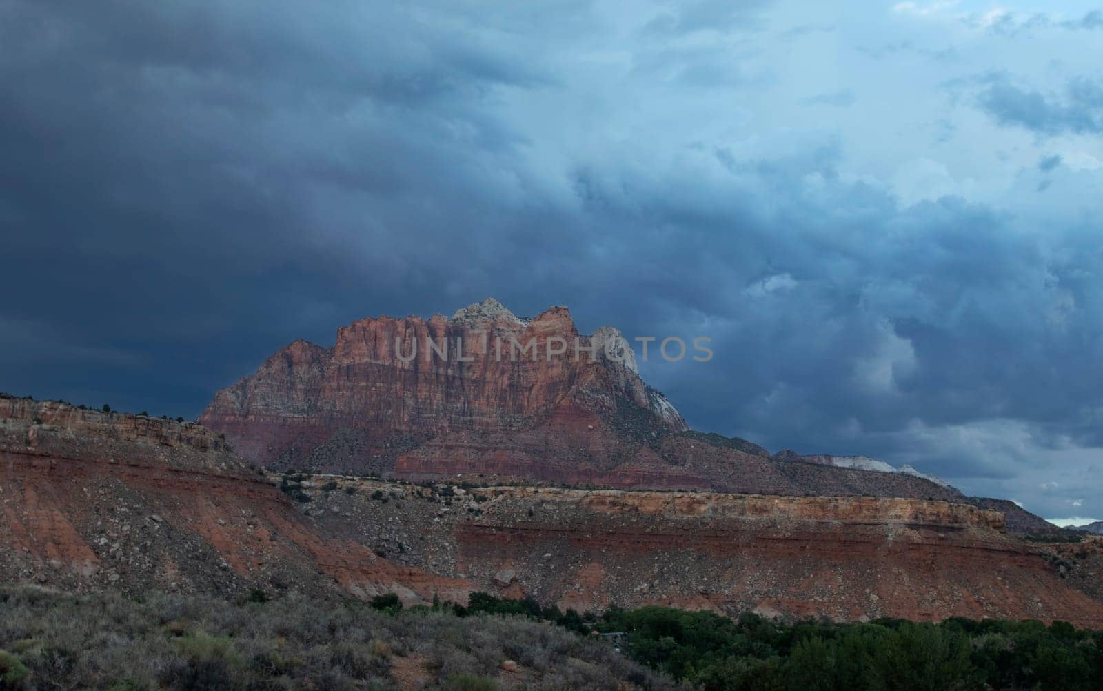 Dark clouds from a seasonal monsoon have appeared at Zion National Park, Utah