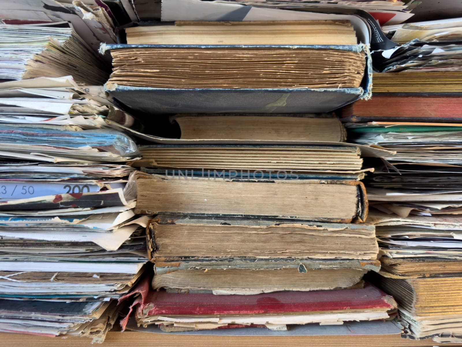 texture a stack of books lies on the table