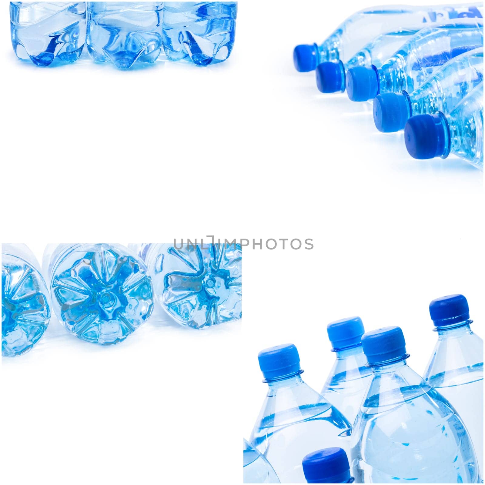 plastic bottles of water on white background by Fabrikasimf