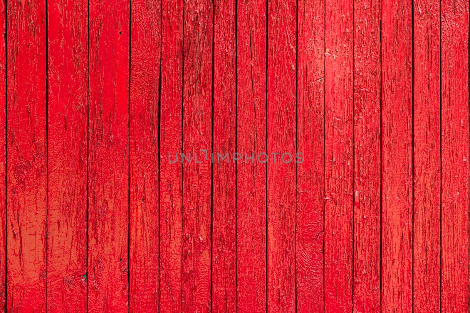 red paint wooden planks fence texture.