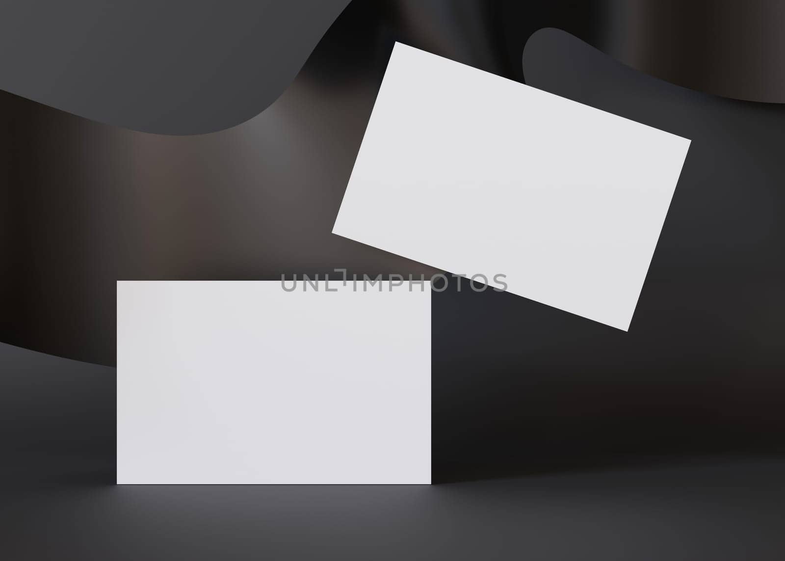 Two blank business cards floating over a wavy black backdrop, perfect for designers to display corporate identity or branding. Business card mockup. European size 3,25 x 2,17 inch. Visiting card. 3D