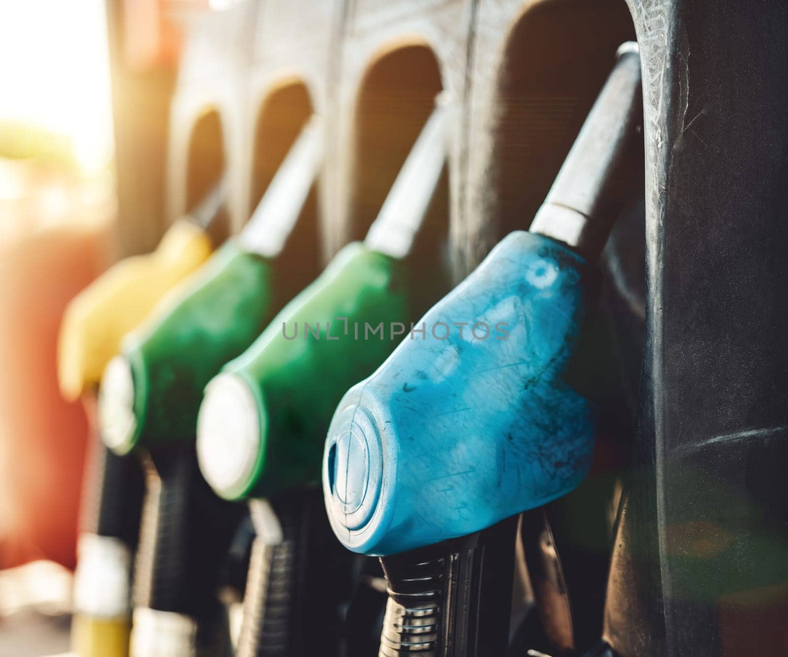 Fuel pump filling nozzles at Gas station, close up view