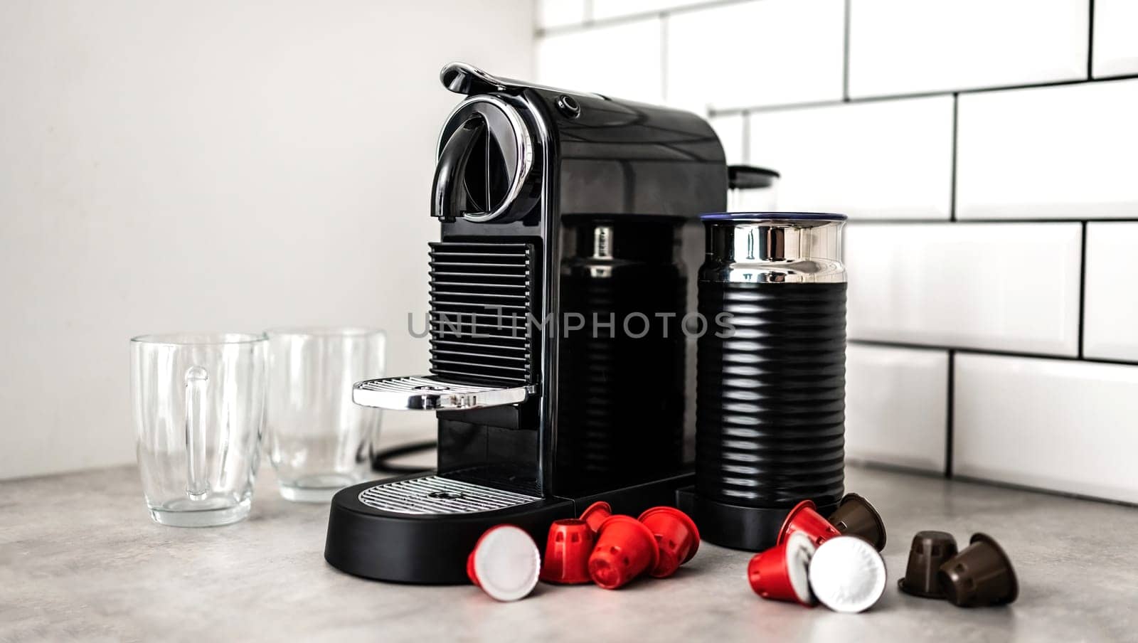 Coffee machine with capsules at domestic kitchen at home. Espresso caffeine beverage maker for energetic morning