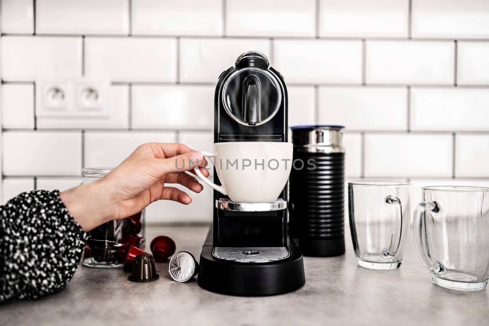 Capsule coffee machine at domestic kitchen by GekaSkr