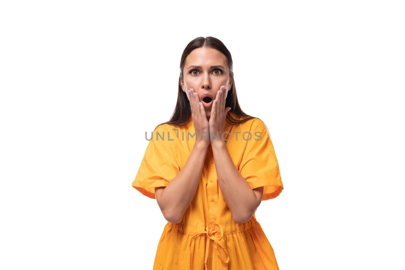 a black-haired slender woman dressed in an orange dress is surprised and opened her mouth by TRMK