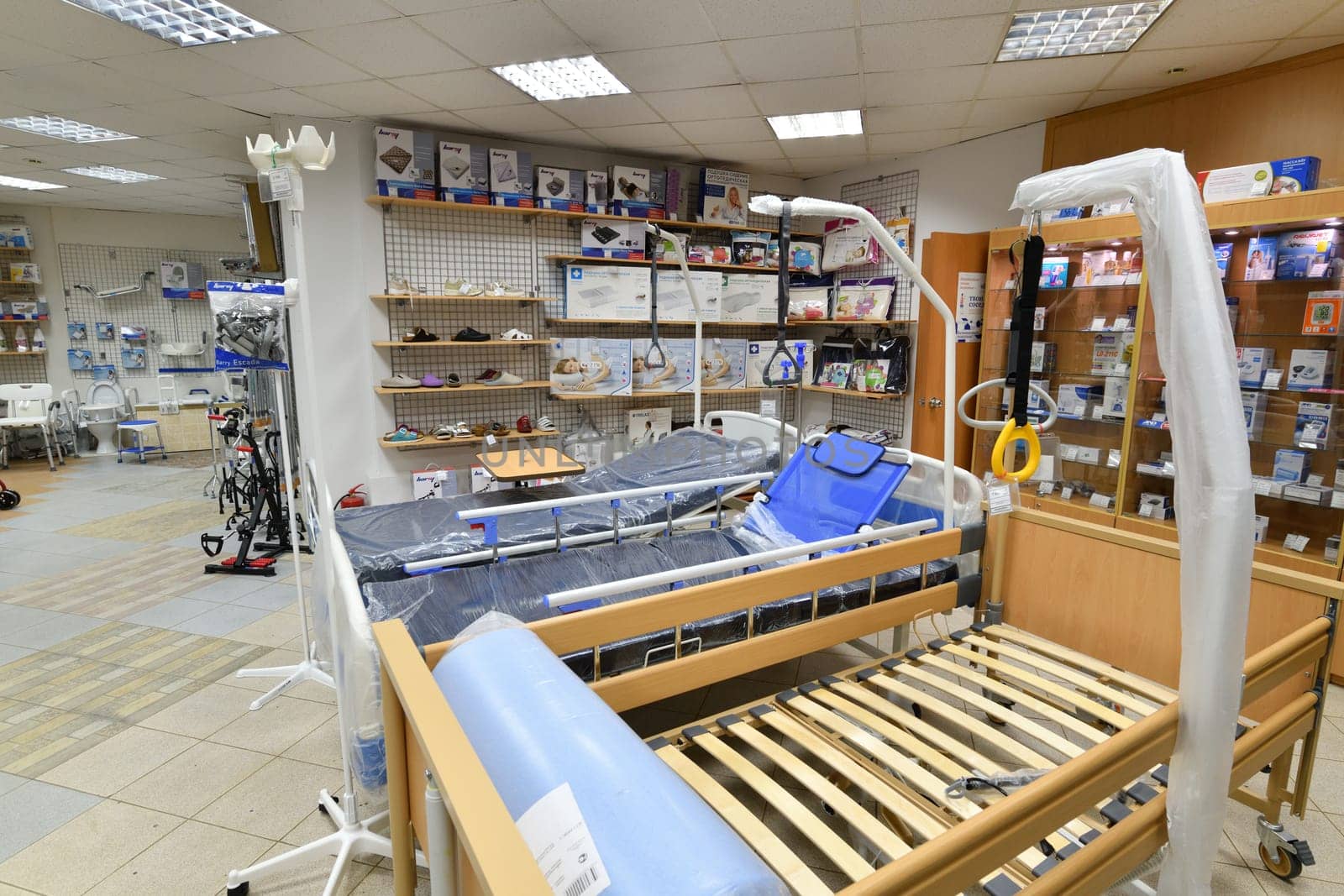 Moscow, Russia - Mar 28. 2024. Beds for patients in a medical store in Zelenograd by olgavolodina