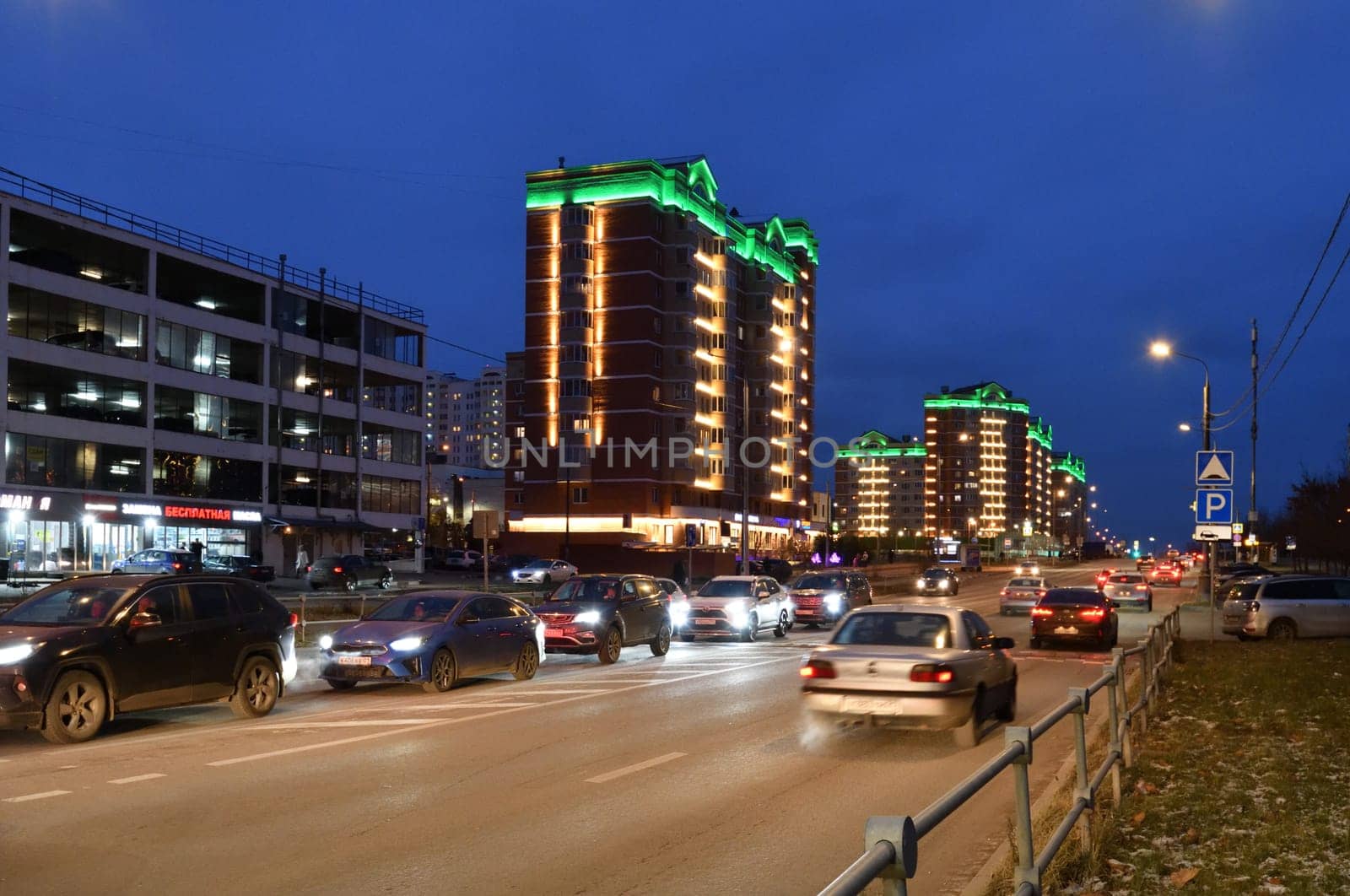 Moscow, Russia - Nov 21. 2023. Evening traffic on the Kamenka street in Zelenograd