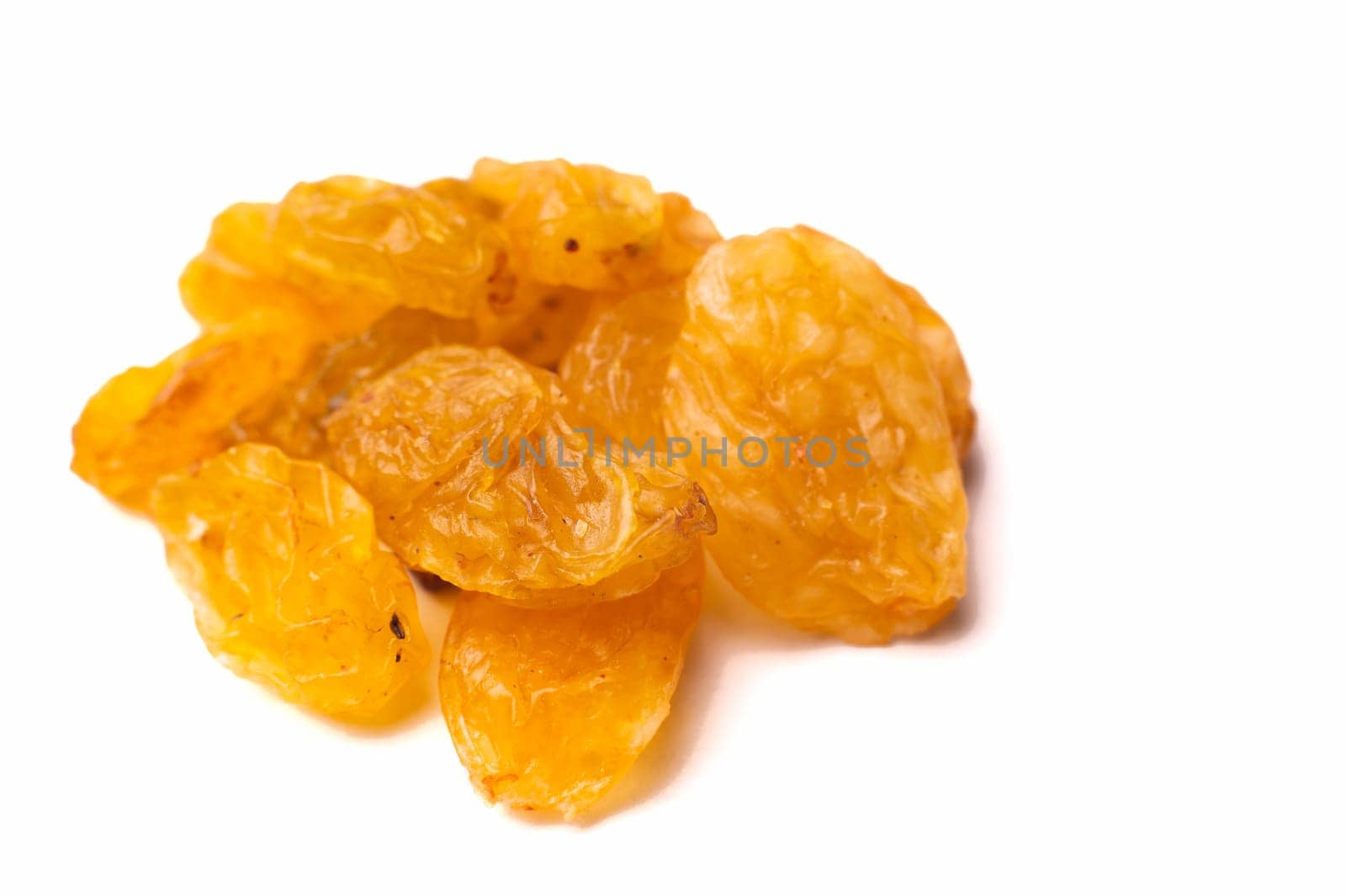 Falling yellow raisins isolated on white background with clipping path by yanik88