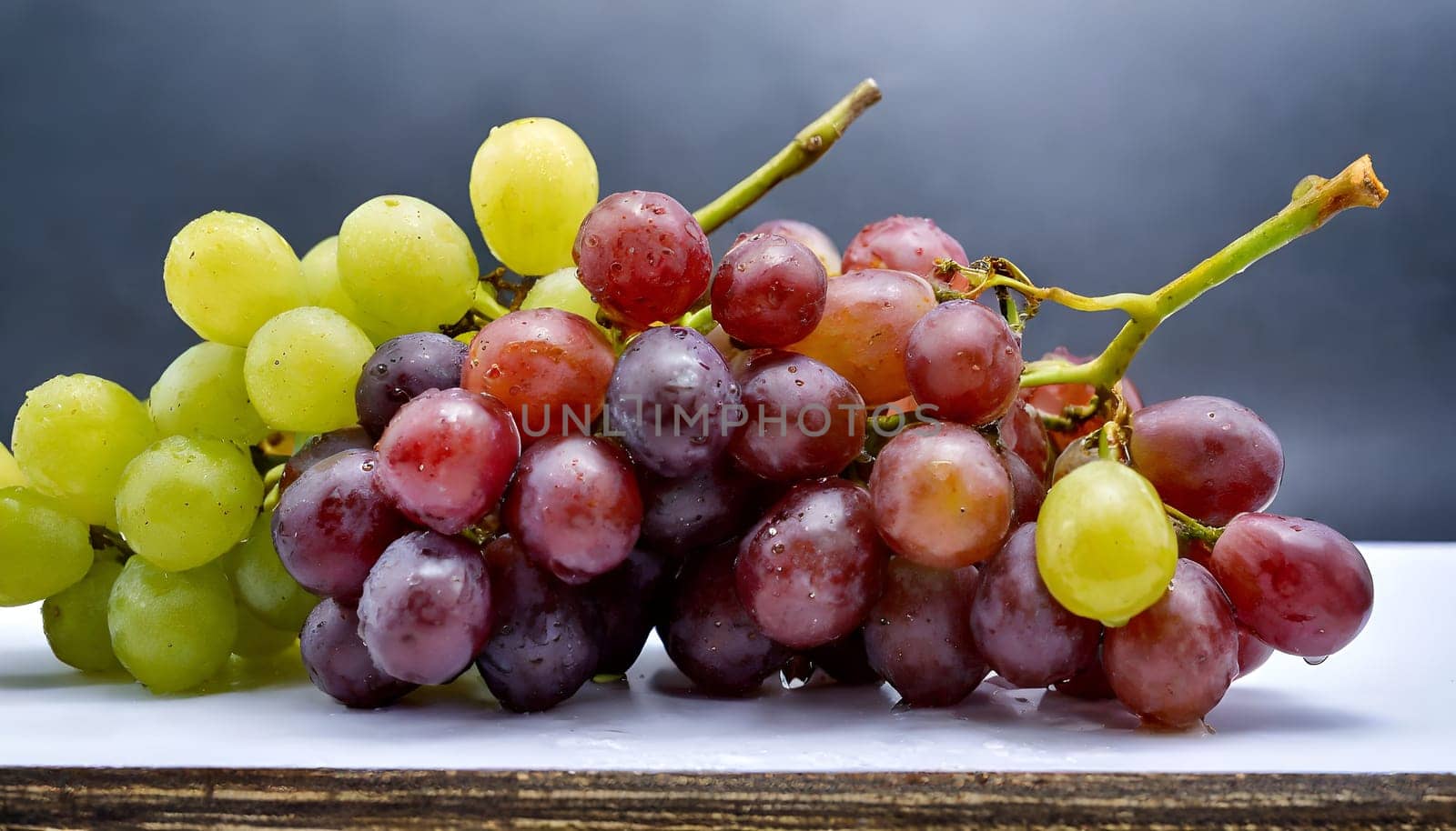 A bunch of grapes, neatly arranged and isolated on a white background. High quality photo