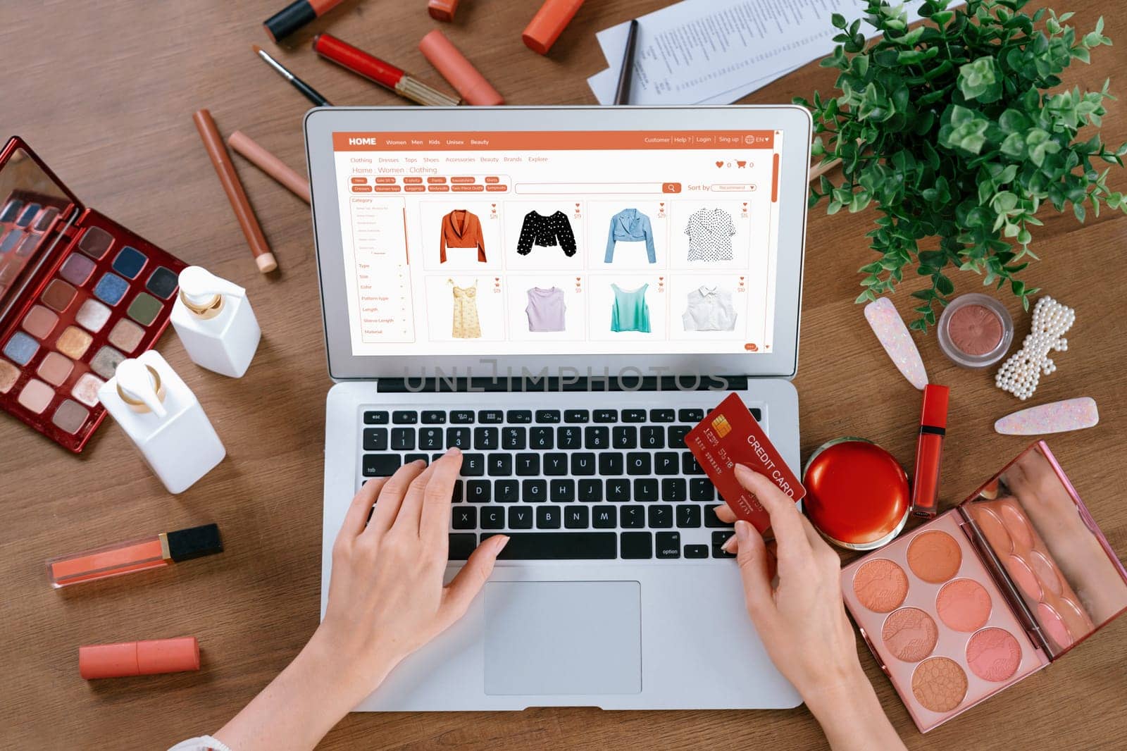 Woman shopping online on internet marketplace browsing for sale items for modern lifestyle and use credit card for online payment from wallet protected by utmost cyber security software