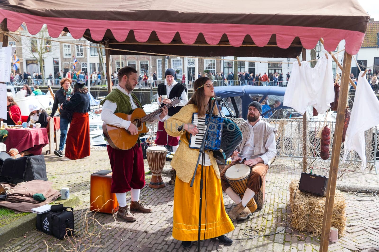 Brielle,Holland,1-04-2024:people making music in traditional traditional costumes celebration of the the first town to be liberated from the Spanish in Den Briel in the Netherlands in 1572