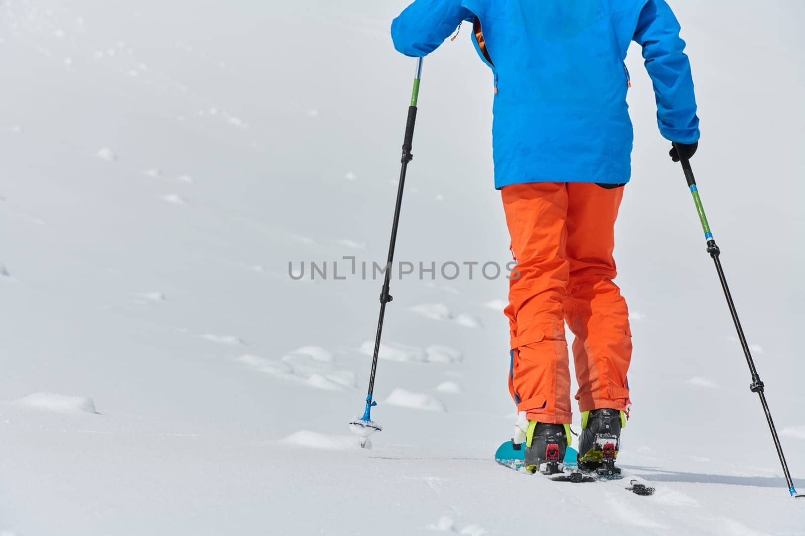 Close-Up of Ski Gear Ready for a Challenging Ascent by dotshock