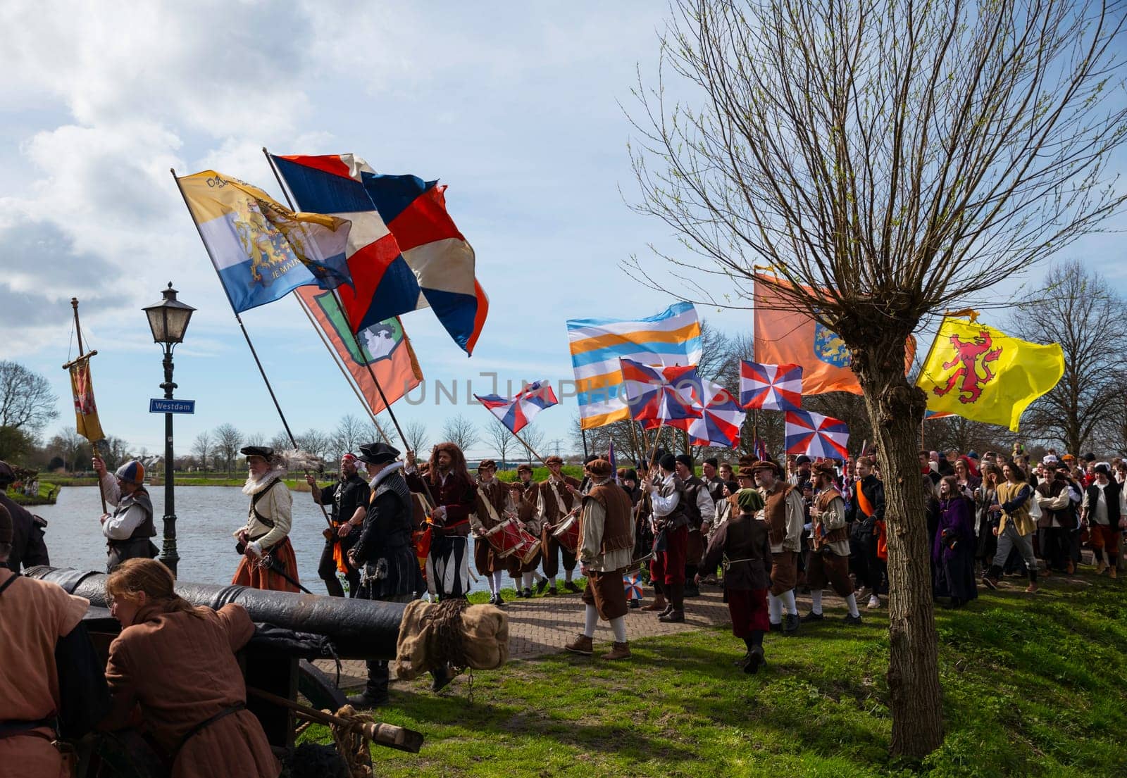Brielle,Holland,1-04-2024:people with the spanish and other flags in traditional traditional costumes celebration of the the first town to be liberated from the Spanish in Den Briel in 1572