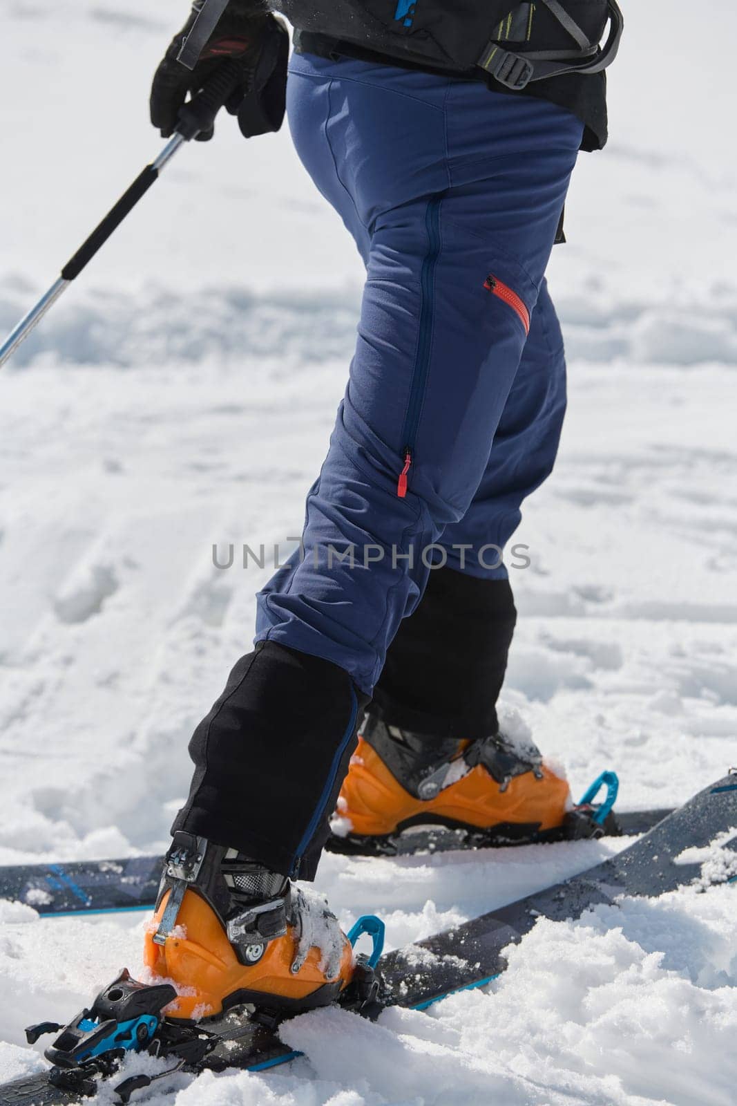 Close-Up of Ski Gear Ready for a Challenging Ascent by dotshock