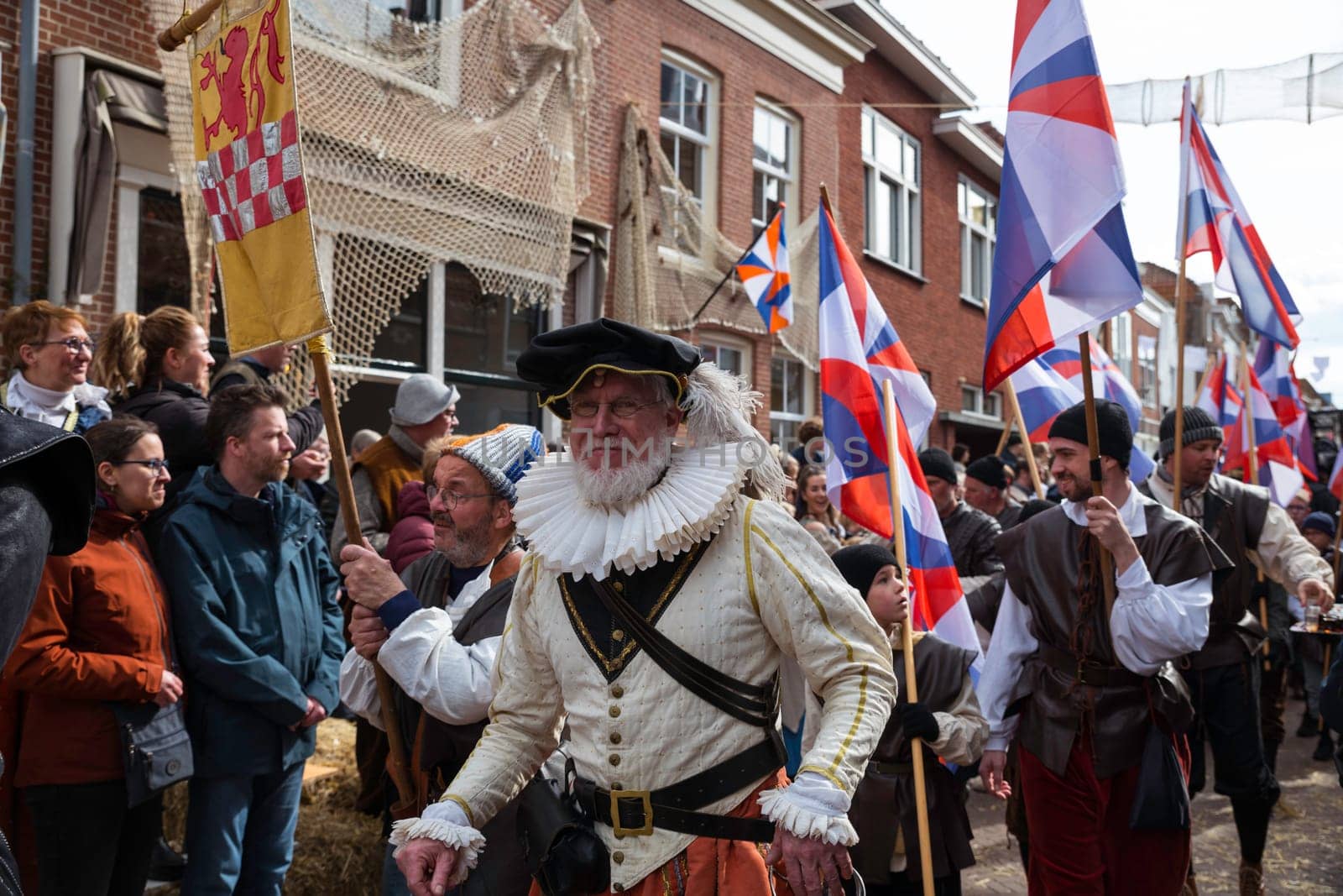 Brielle,Holland,1-04-2024:Coppelstock and Paddeltje ready to storm the gate ,the highlight of the celebration of the liberation of Den Briel,the first town to be liberated from the Spanish in 1572