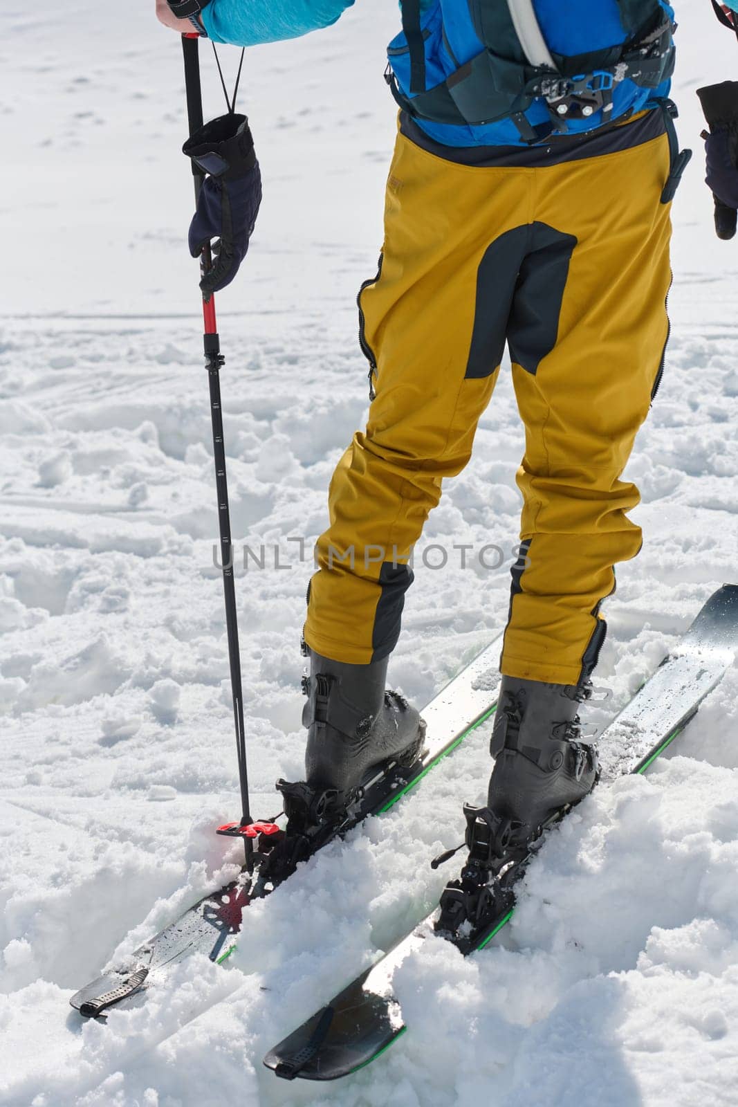 Close-Up of Ski Gear Ready for a Challenging Ascent by dotshock