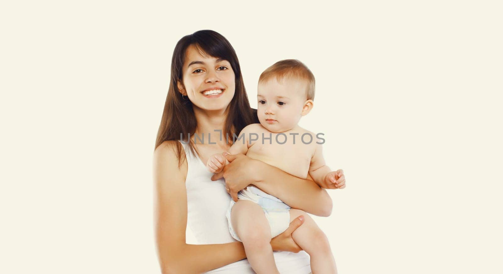 Happy cheerful smiling young mother holding baby on white background by Rohappy