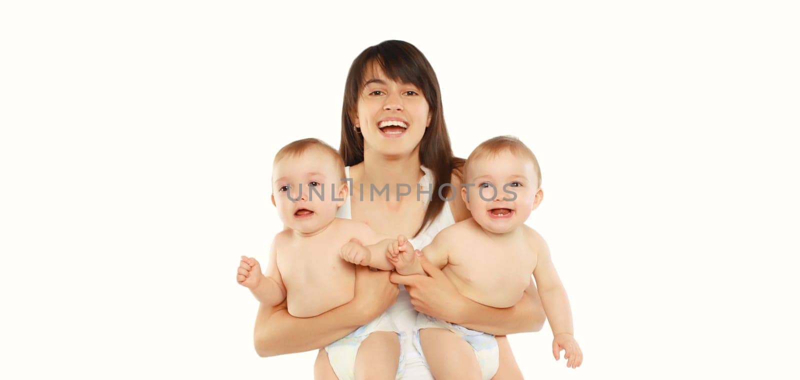 Happy cheerful smiling young mother holding baby on white background by Rohappy
