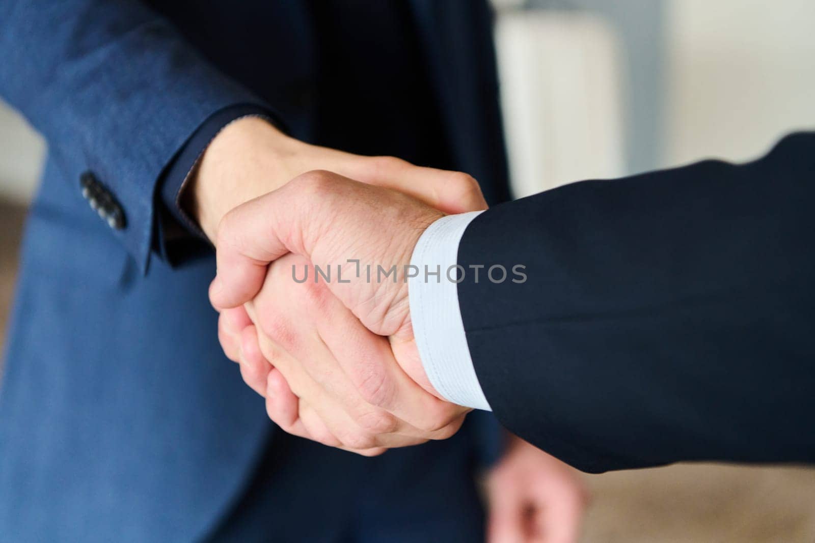 Businessmen making handshake with partner, greeting, dealing, merger and acquisition, business joint venture concept, for business, finance and investment background, teamwork and successful business by dotshock