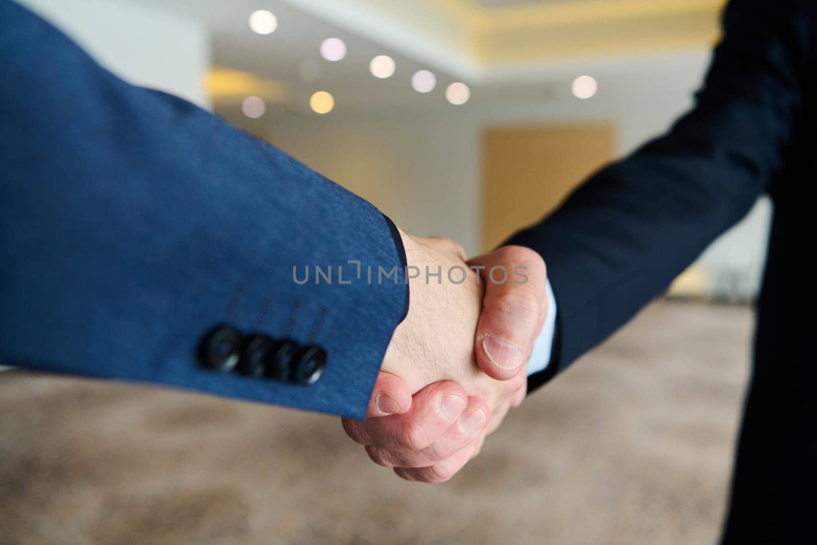 Businessmen making handshake with partner, greeting, dealing, merger and acquisition, business joint venture concept, for business, finance and investment background, teamwork and successful business.