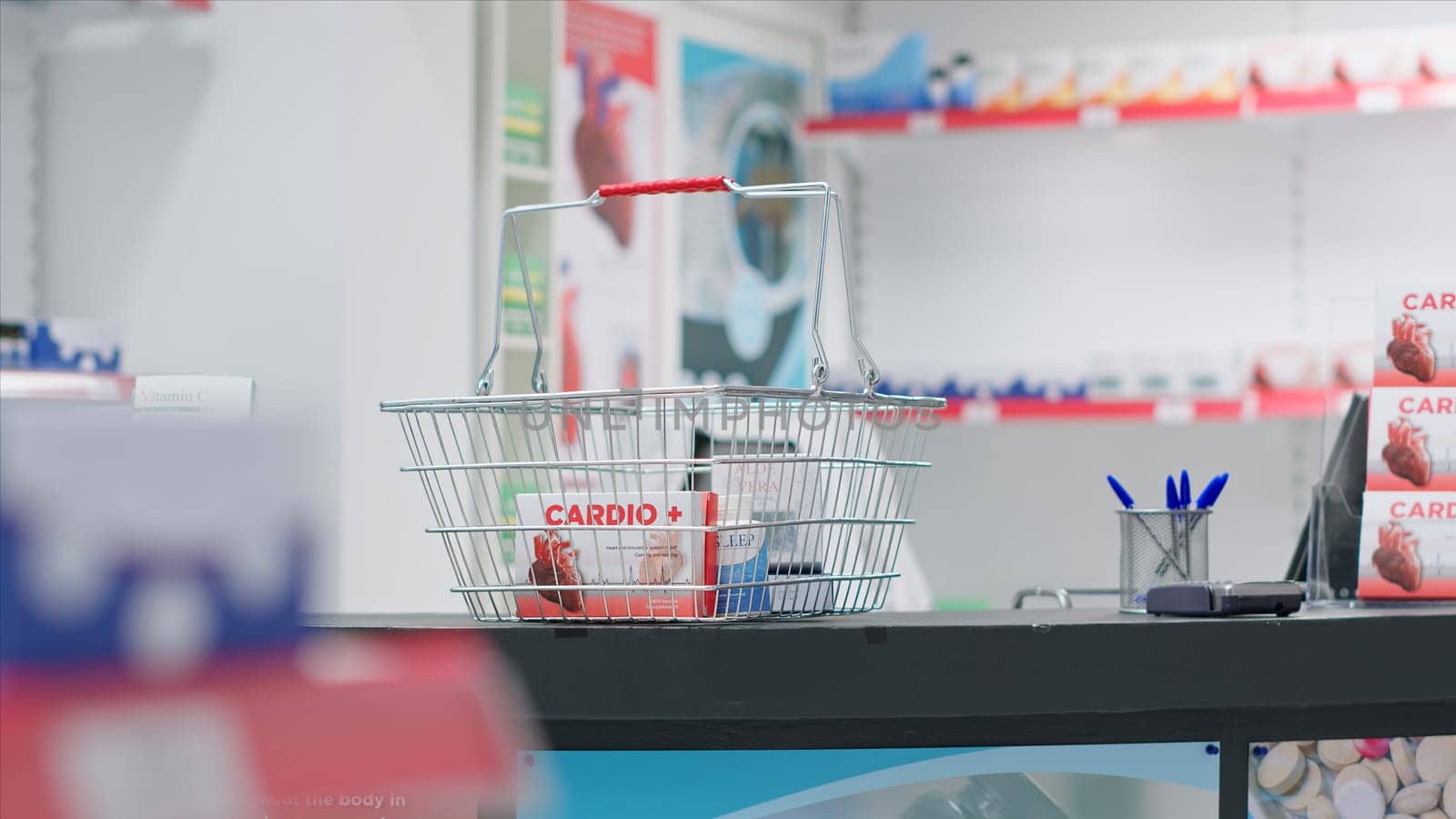 Empty pharmacy checkout counter with boxes of medicine, selling modern pills or pharmaceutical drugs on shelves in drugstore clinic. Medical supplies are for sale along with other treatments.