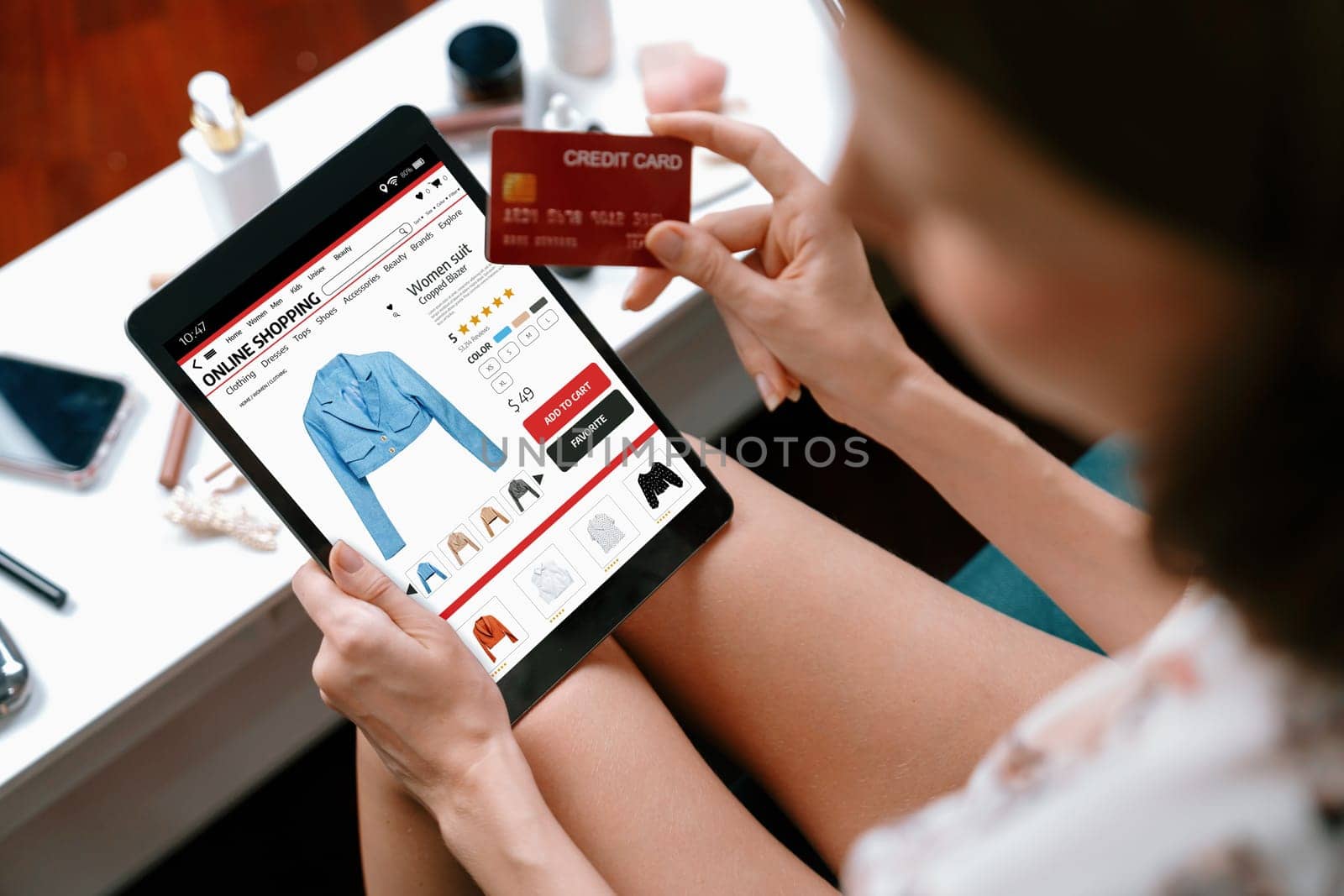 Woman shopping online on internet marketplace browsing for utmost sale items by biancoblue