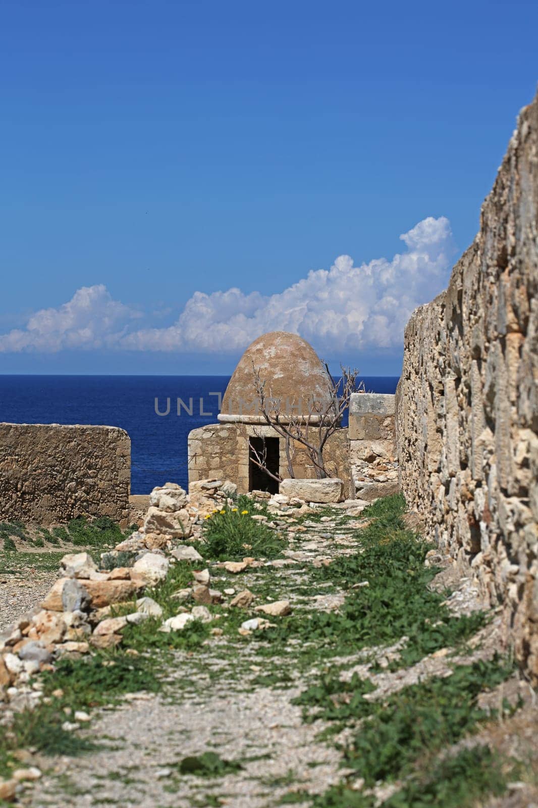 Fortezza fortress castle in Crete island holidays exploring the old ancient stone city monuments close up summer background carnival season high quality big size printings