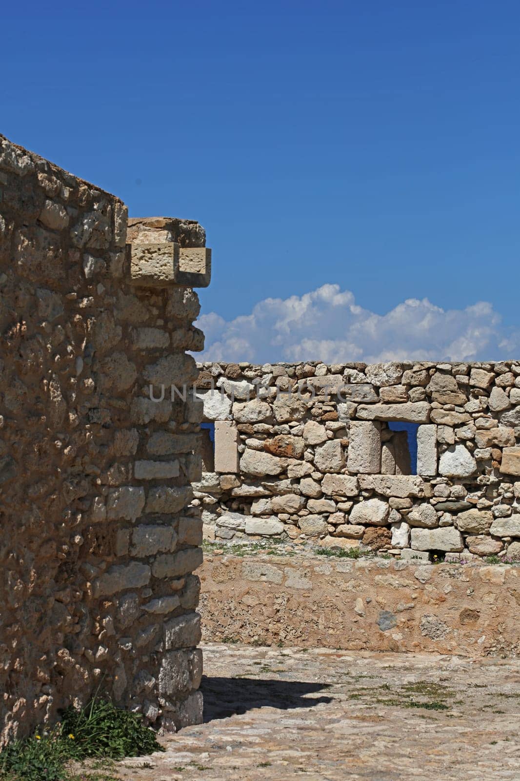 Fortezza fortress castle in Crete island Rethimno holidays exploring the old ancient stone city monuments close up summer background carnival season high quality big size printings