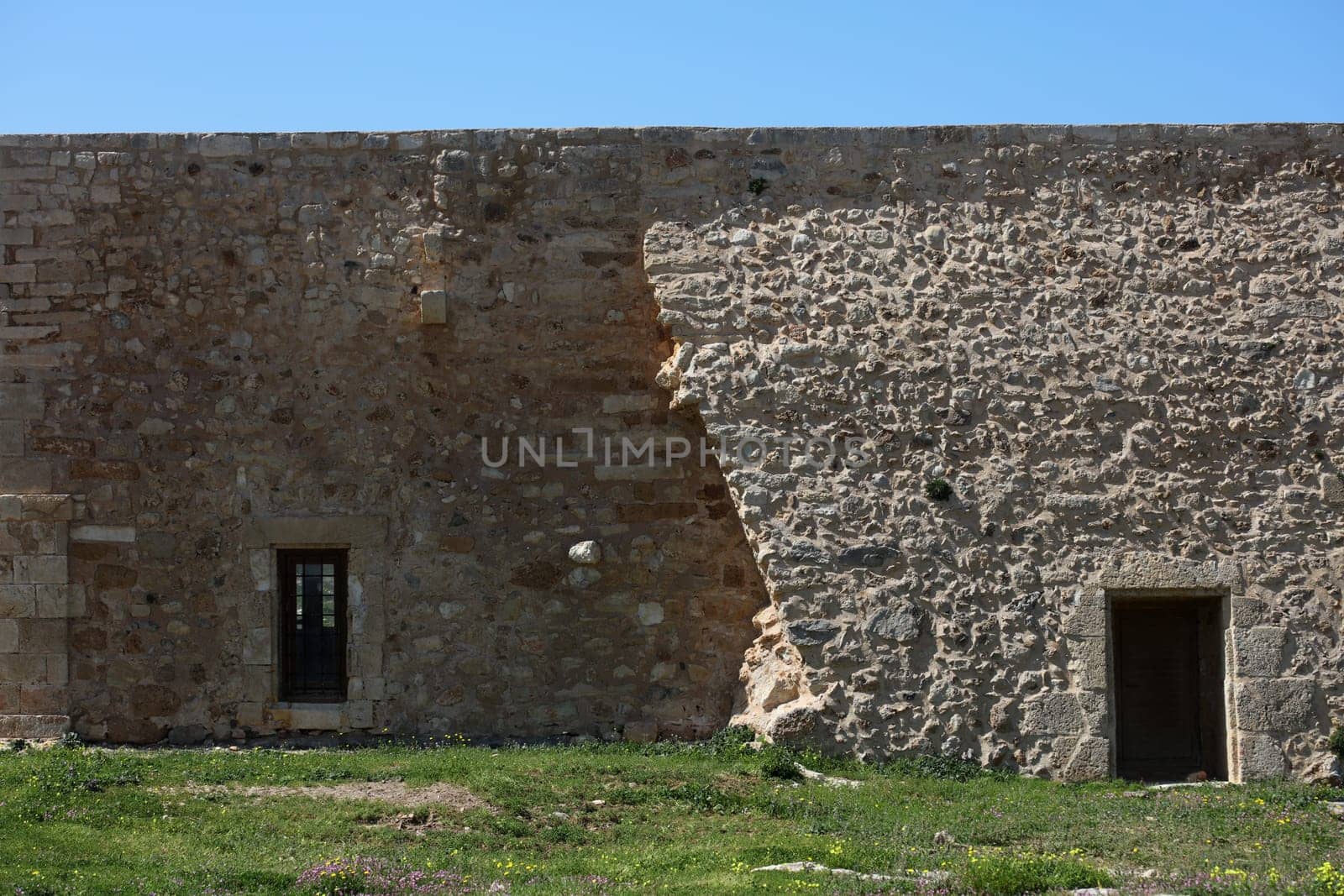 Fortezza fortress castle in Crete island Rethimno holidays exploring the old ancient stone city monuments close up summer background carnival season high quality big size printings