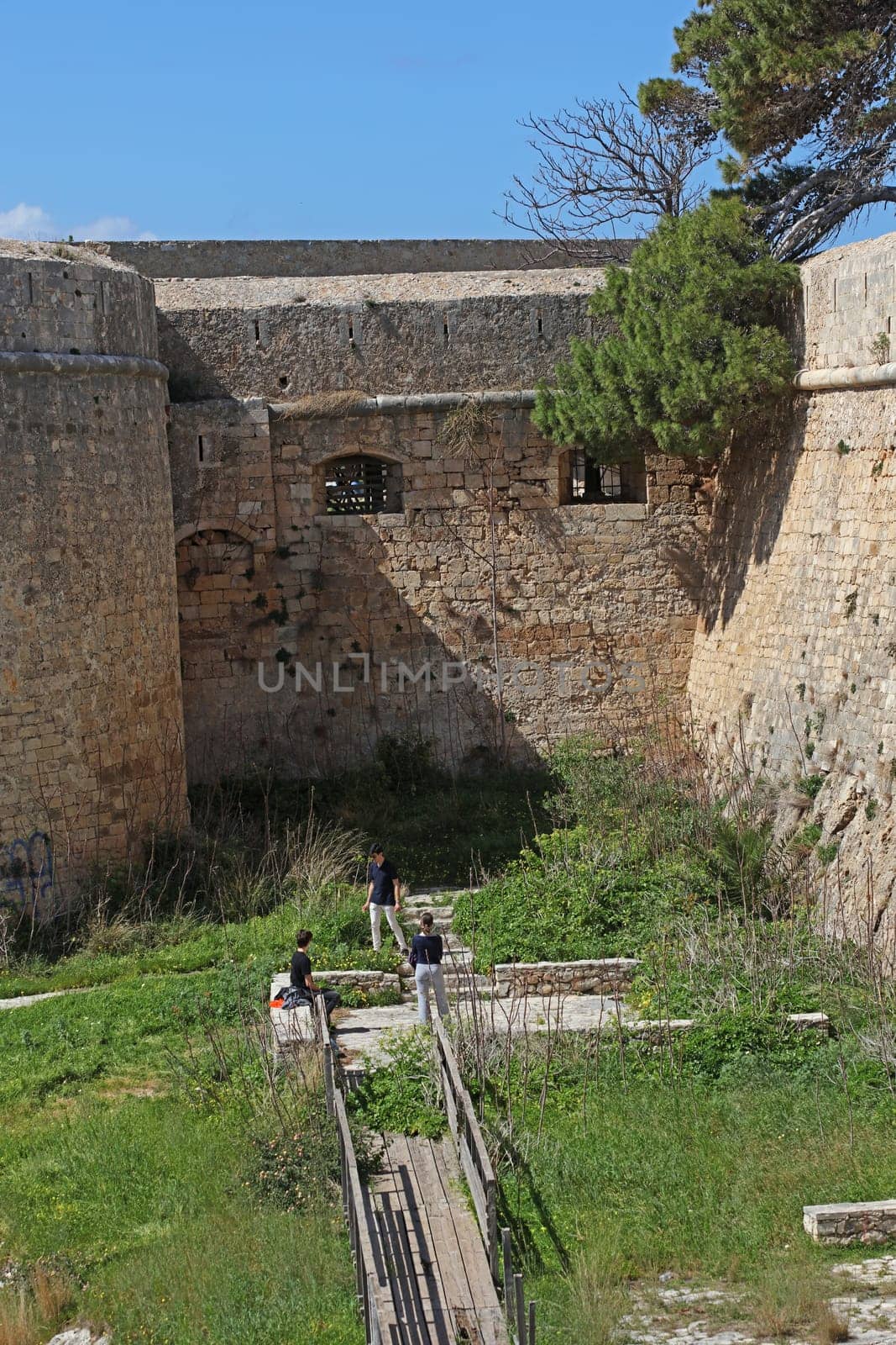 Fortezza fortress castle in Crete island Rethimno holidays exploring the old ancient stone city monuments close up summer background carnival season high quality big size printings