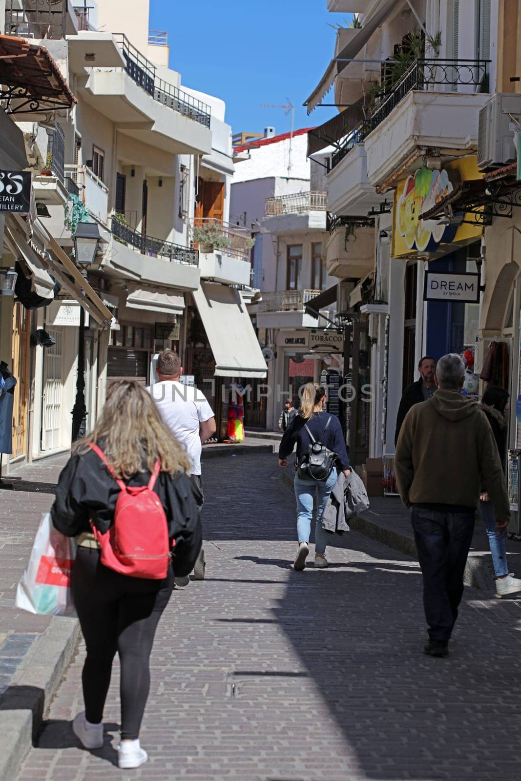 Rethimnon, Greece, Friday 15 March 2024 Crete island holidays exploring the old ancient stone city roads close up summer background carnival season high quality big size printings