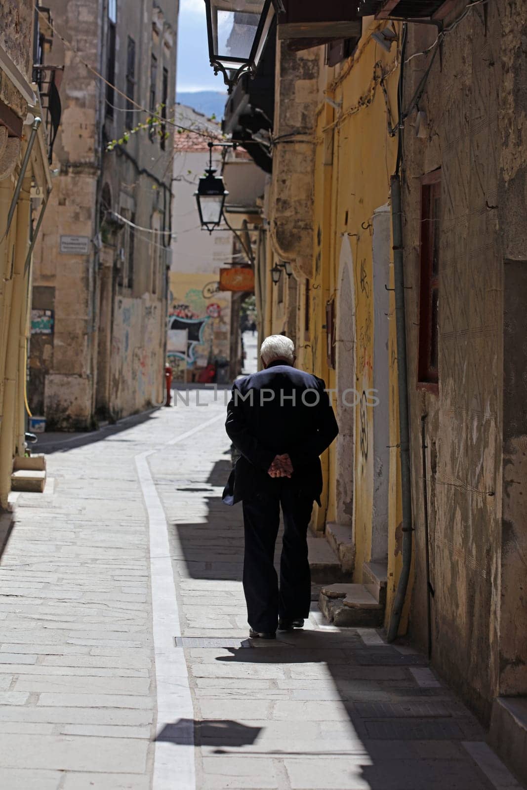 Rethimnon, Greece, Friday 15 March 2024 Crete island holidays exploring the old ancient stone city roads close up summer background carnival season high quality big size printings