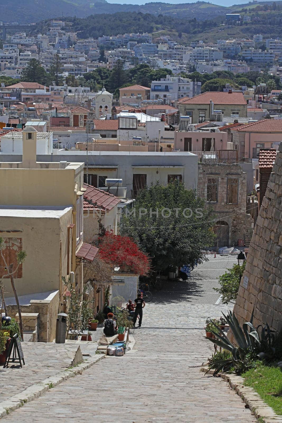 Rethimnon, Greece, Friday 15 March 2024 Crete island holidays exploring the old ancient stone city roads close up summer background carnival season high quality big size printings