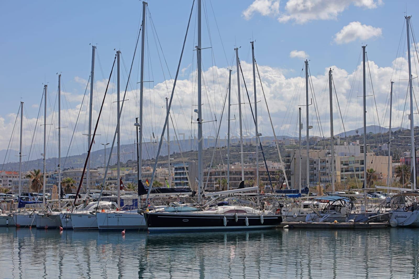 Rethimno, Greece, Friday 15 March 2024 Crete island holidays exploring the city port riviera luxury yachts close up summer background carnival season high quality big size prints