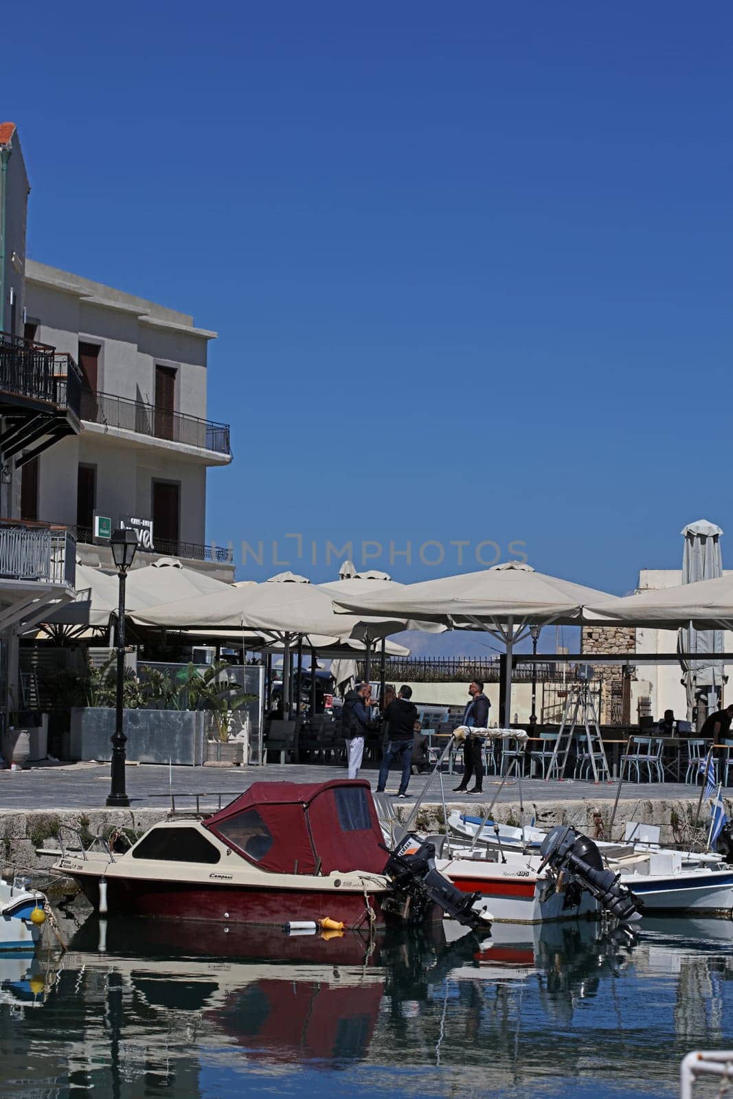 Rethimno, Greece, Friday 15 March 2024 Crete island holidays exploring the city port riviera luxury yachts close up summer background carnival season high quality big size prints