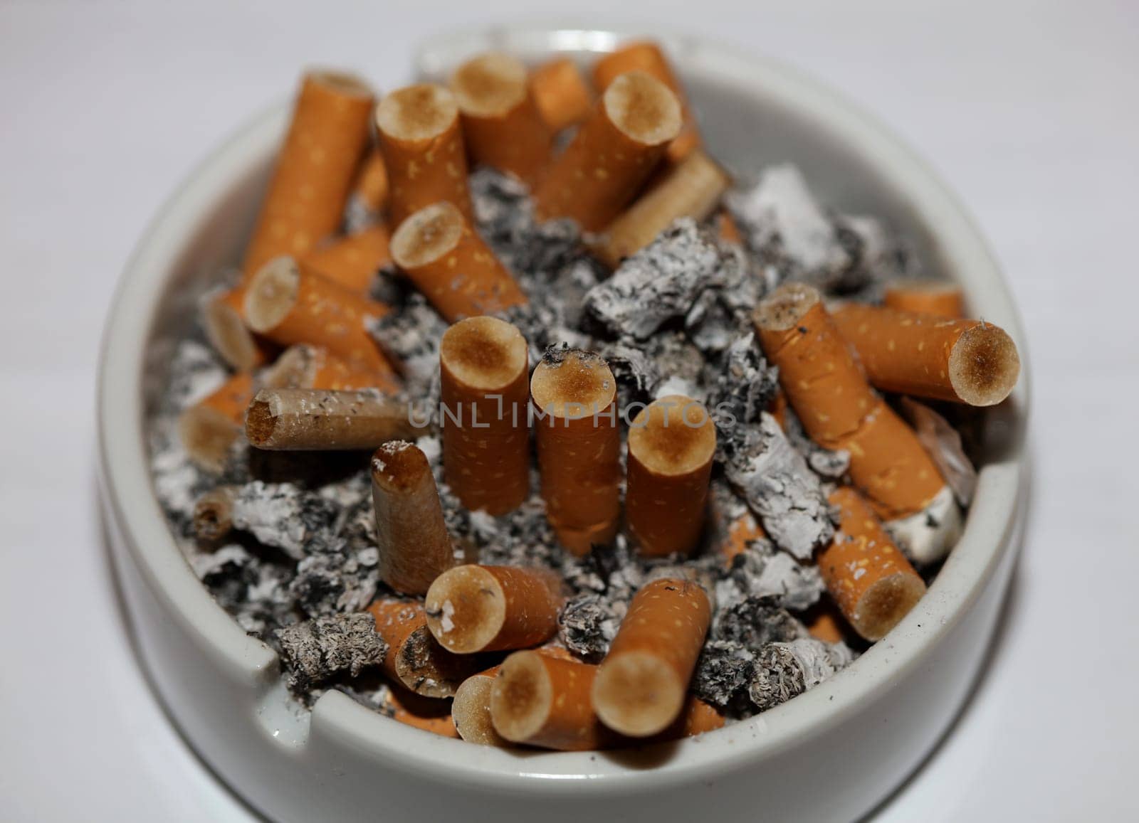 Full ashtray of cigarettes close up macro view smoking habits hi-res stock photography and images high quality big size instant downloads