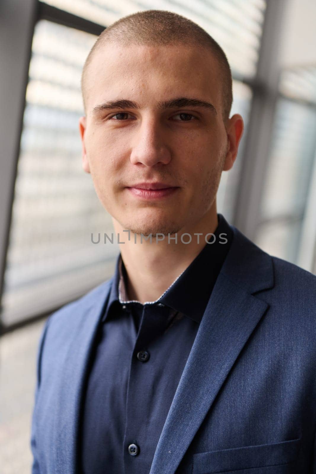 Young Successful Business Entrepreneur in Modern Conference Setting by dotshock