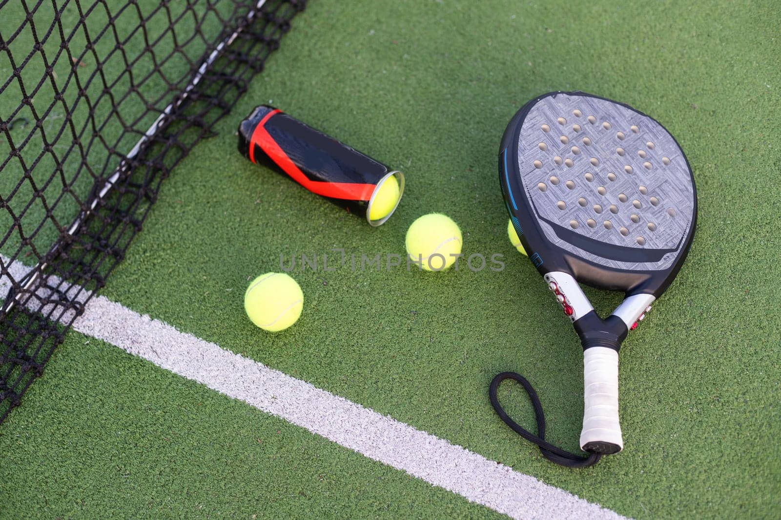 paddle rackets on the playing court. High quality photo