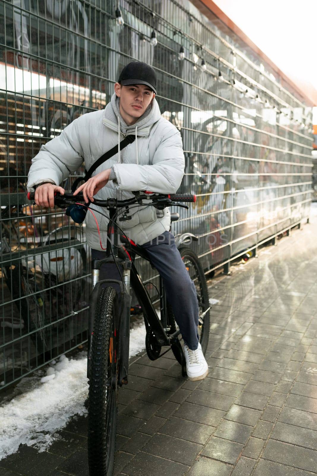 European man takes a bike ride through the city.