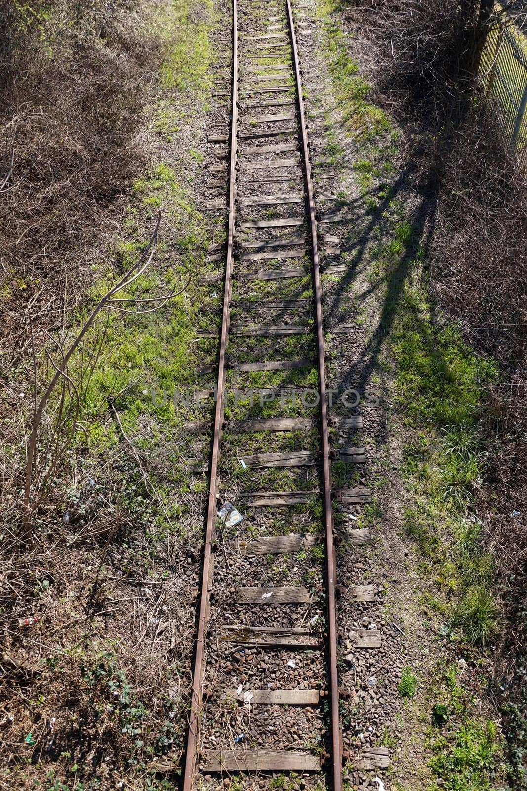 old rusty abandoned railway, top view by Annado