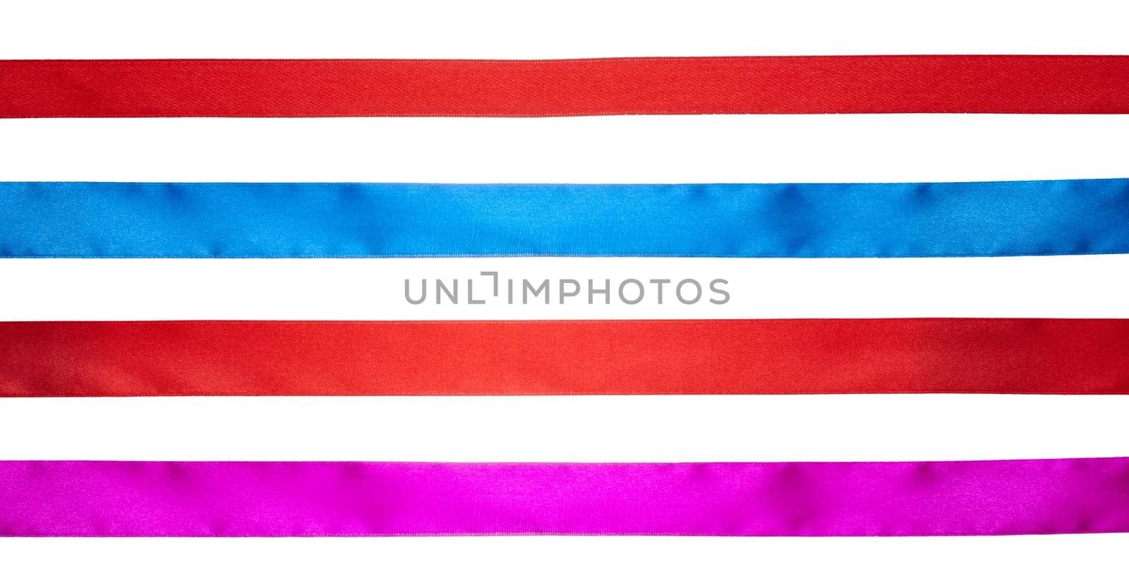 Red, blue and pink silk ribbons on isolated background