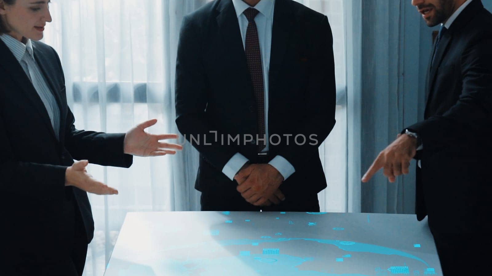 Top view of project manager looking hologram of global networking connection table surrounded by diverse business people brainstorm and planning strategy by using digital communication. Directorate.