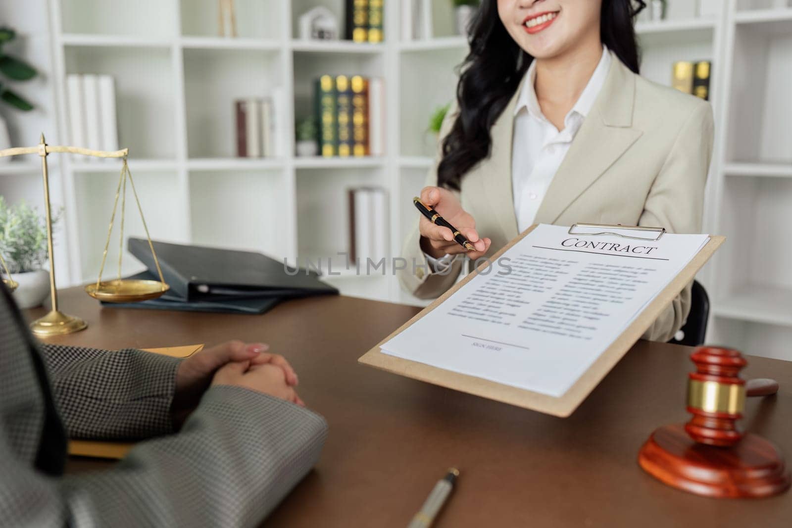 Lawyers provide advice to client are business partner. Lawyer working with client discussing contract document in office, consulting to help customer.