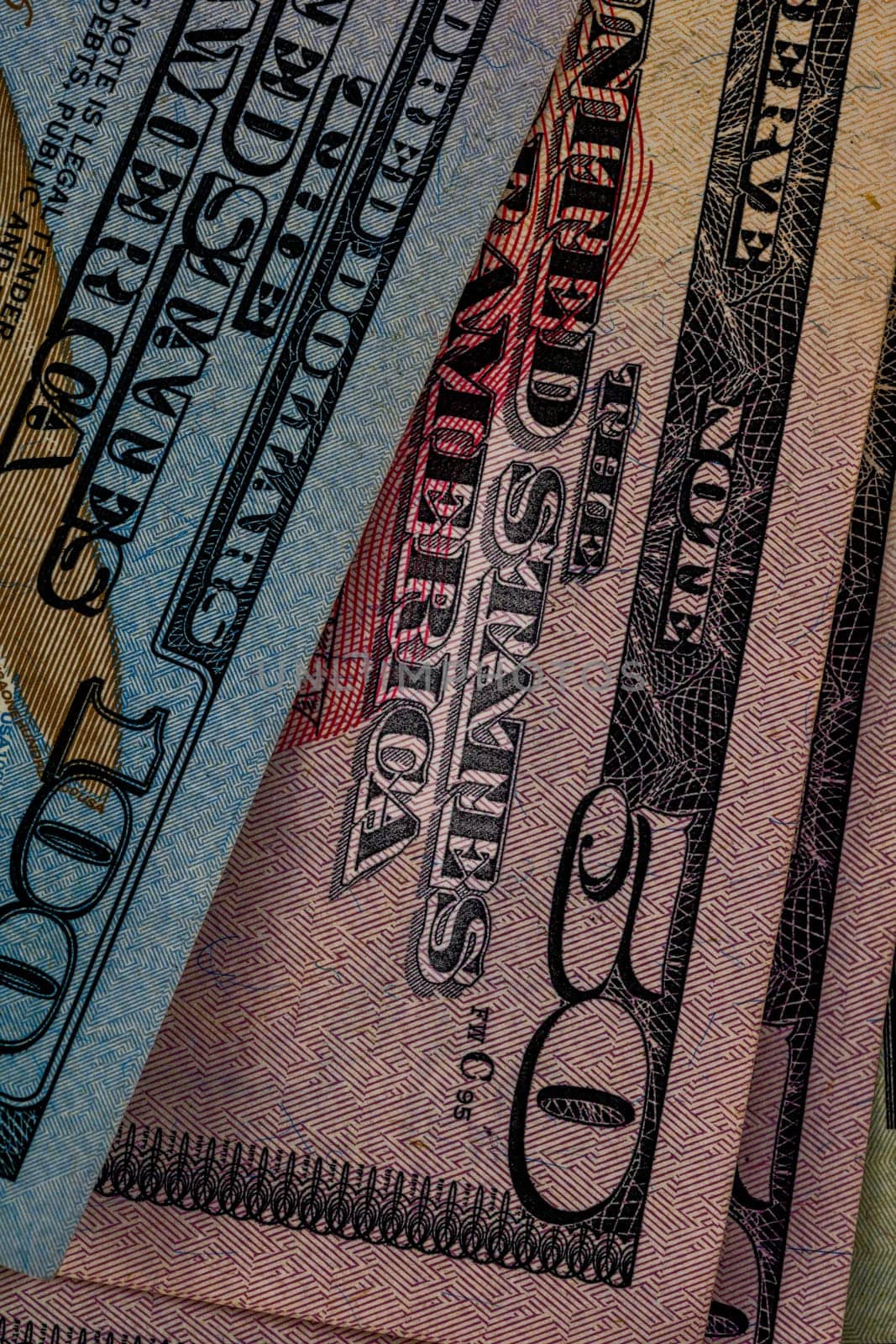 USD money banknotes, detail photo of US dollars by vladispas